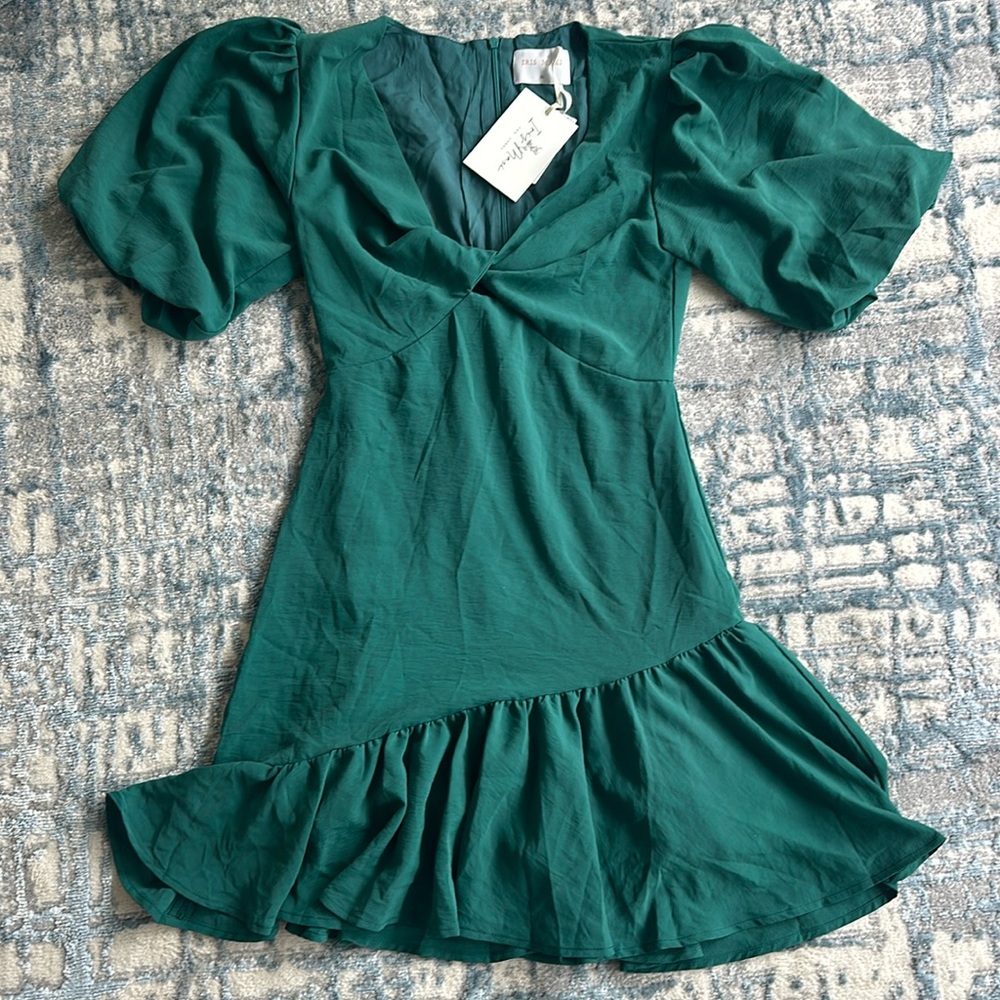 Green dress with ruffles at bottom and shoulders